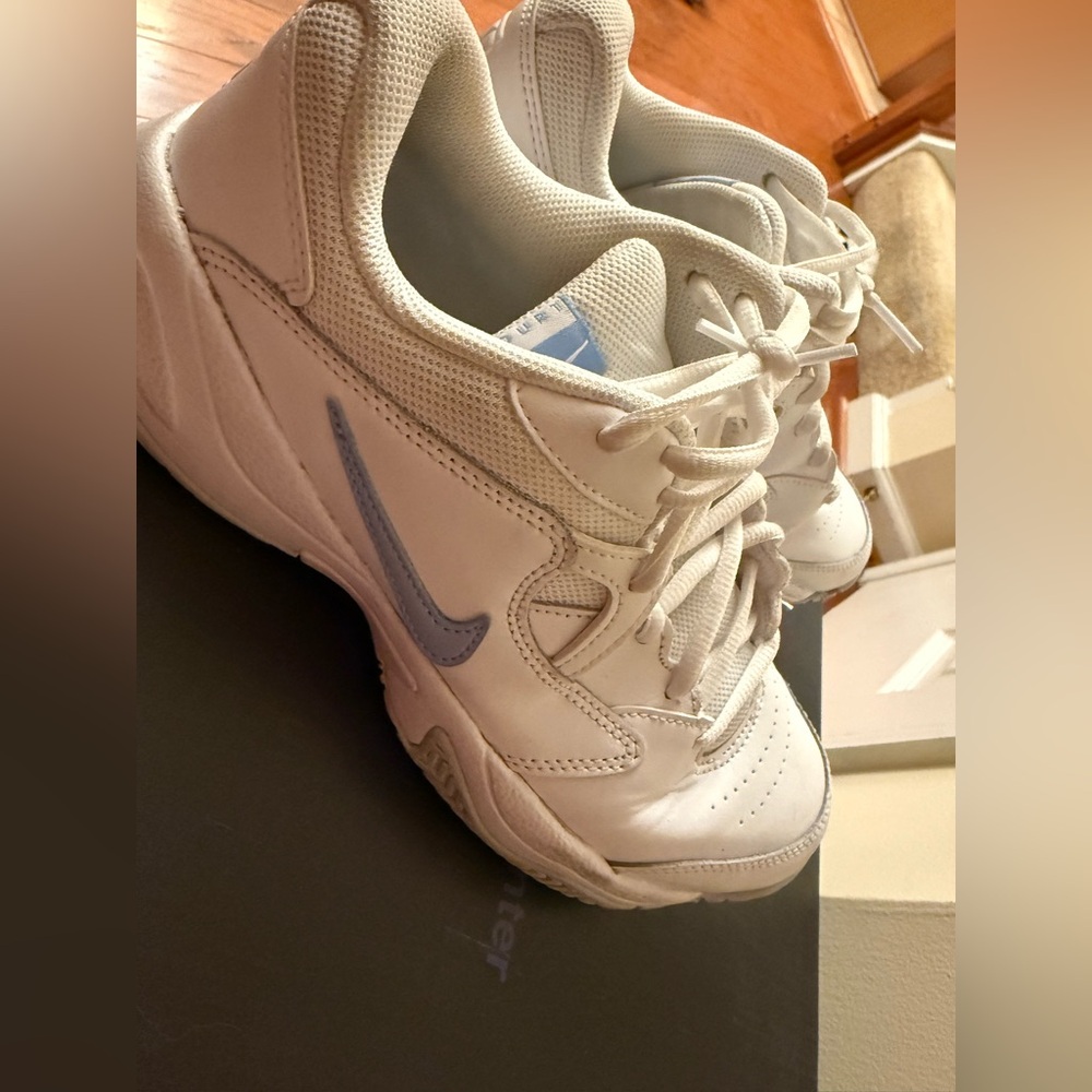 White Nike Sneakers with Blue Accents